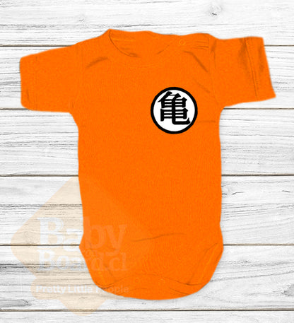 73.- Conjunto Polera Adulto + Body Bebé Goku